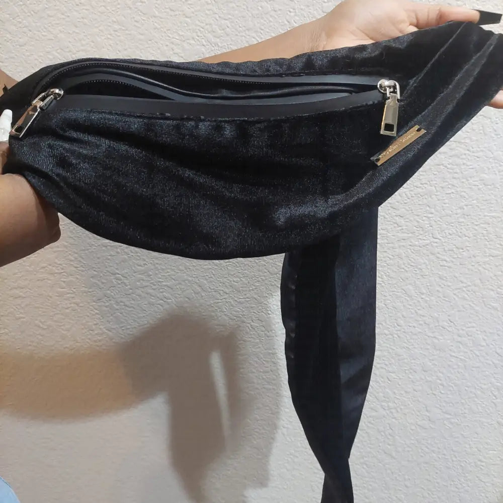 Stretch velvet bag containing RM’s After Five scarves