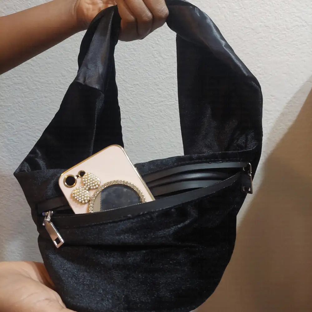 RM’s fashion scarves in a soft stretch velvet bag